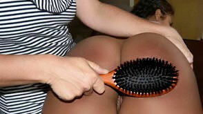Cleo gets a hairbrush spanking