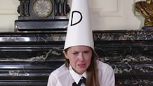 Waering the Dunce hat